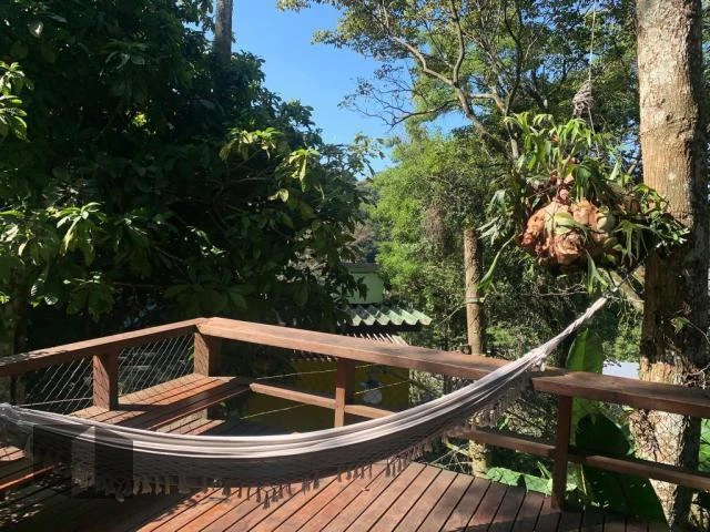 Casa com 4 quartos e varanda, estilo rústico — photo 2