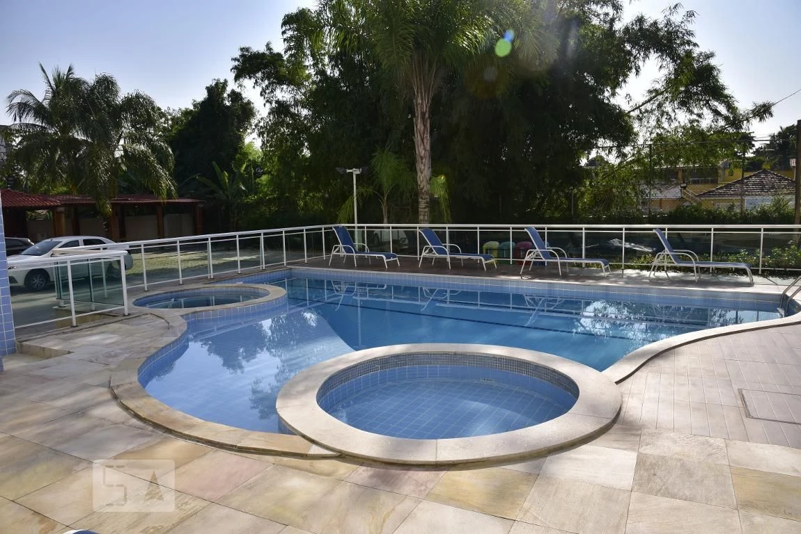 2-bedroom apartment in a building with a pool — photo 42