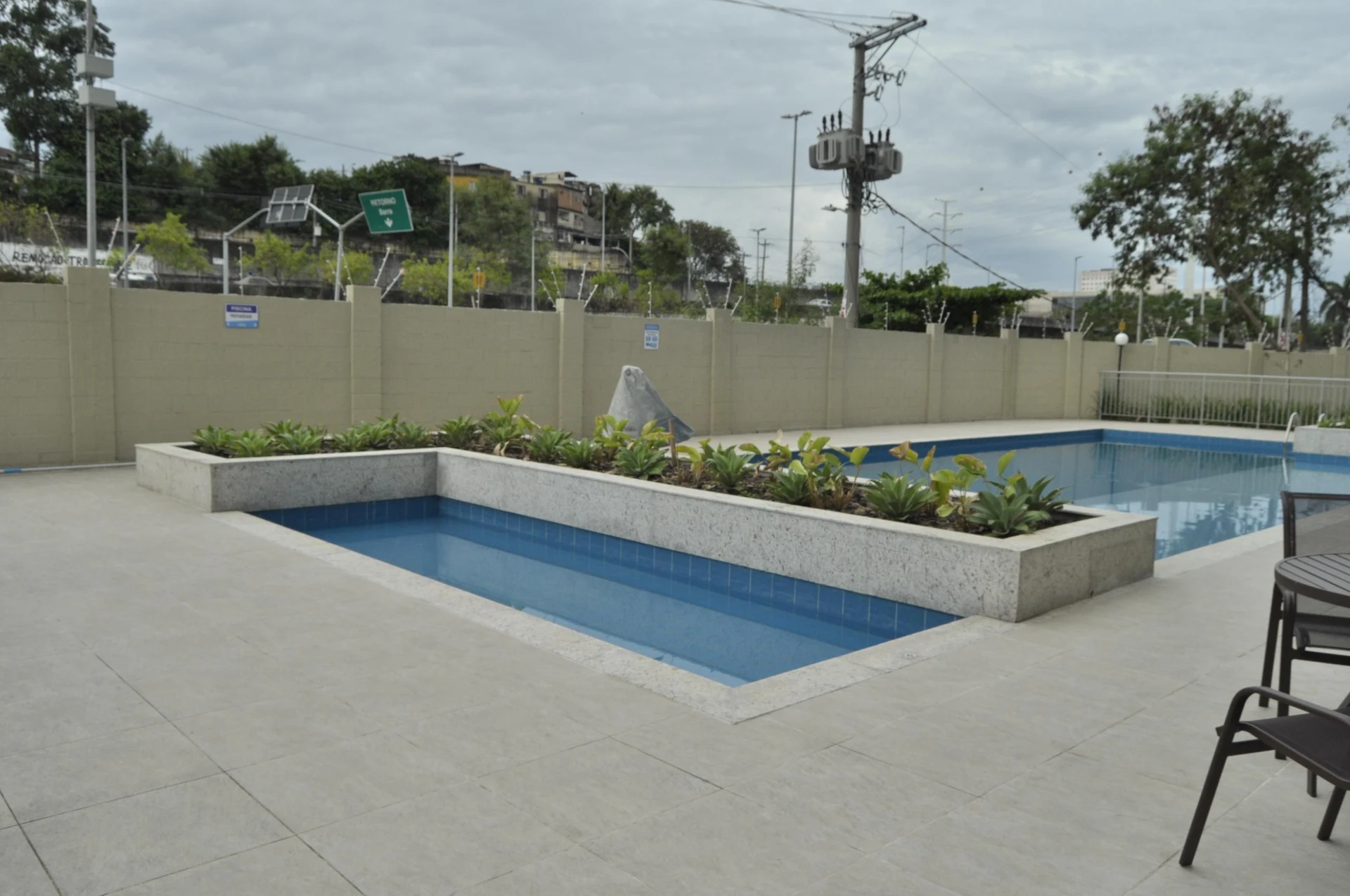 2-bedroom apartment in a building with a pool — photo 25