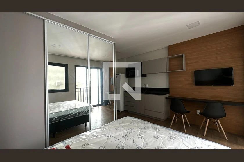 Furnished studio with 1 bedroom and compact kitchenette — photo 6