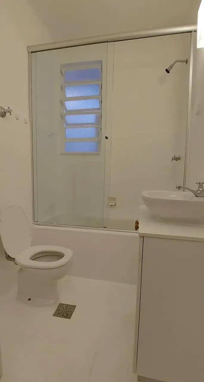 1-bedroom apartment with wood floors and glass shower — photo 4