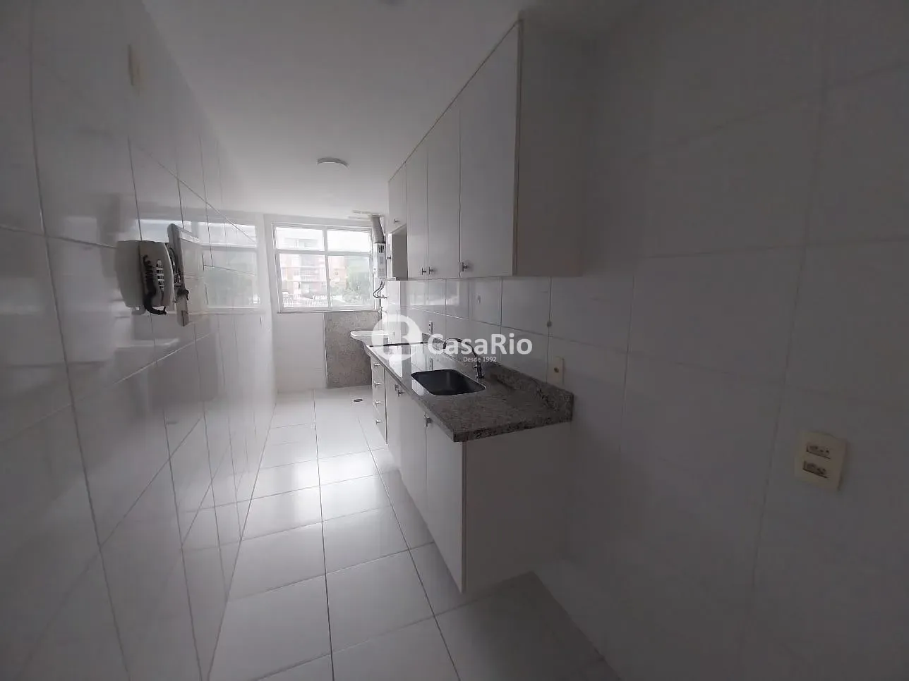 2-bedroom apartment in a building with a pool — photo 19