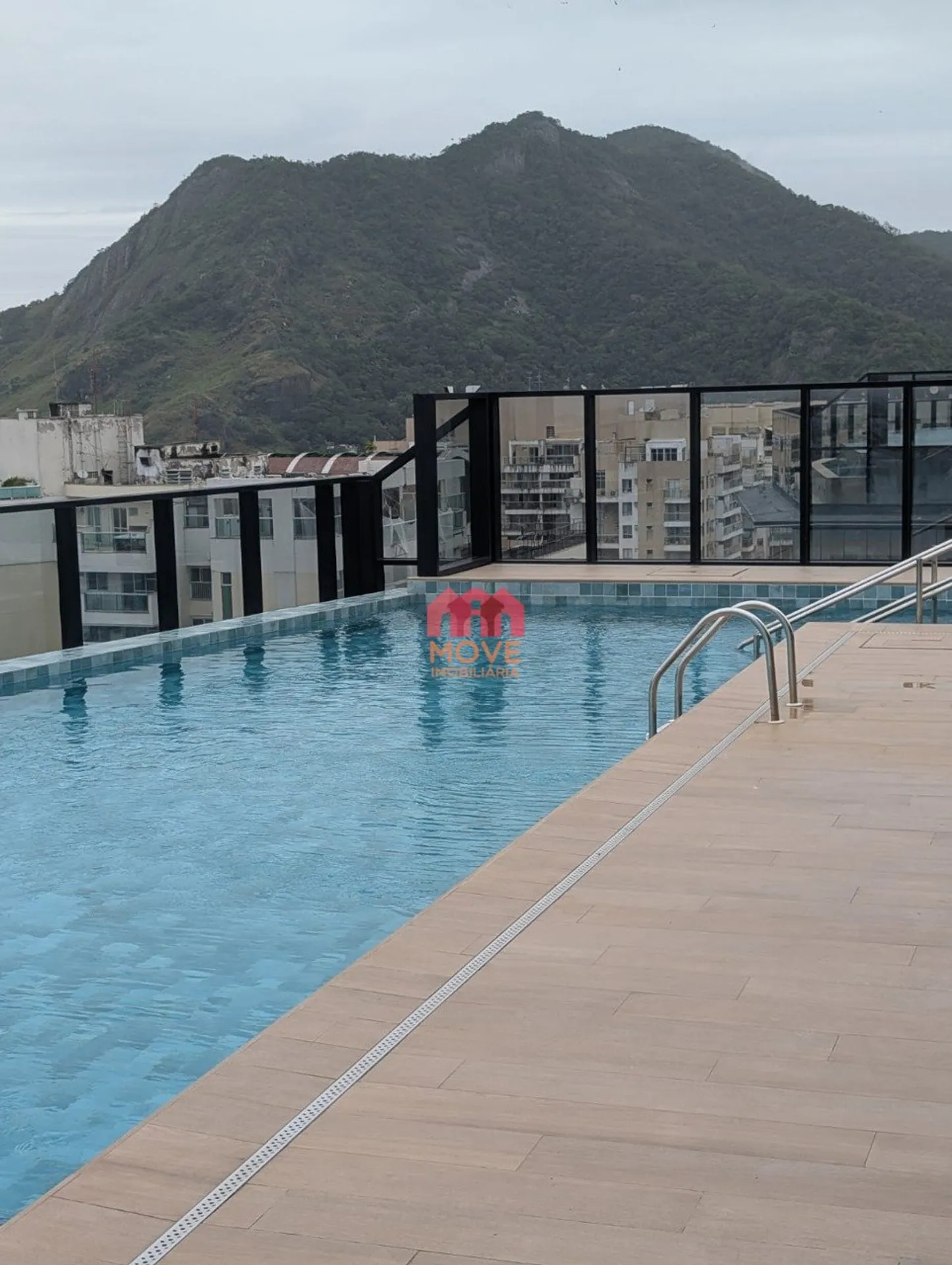 2-bedroom apartment in a building with a pool — photo 8