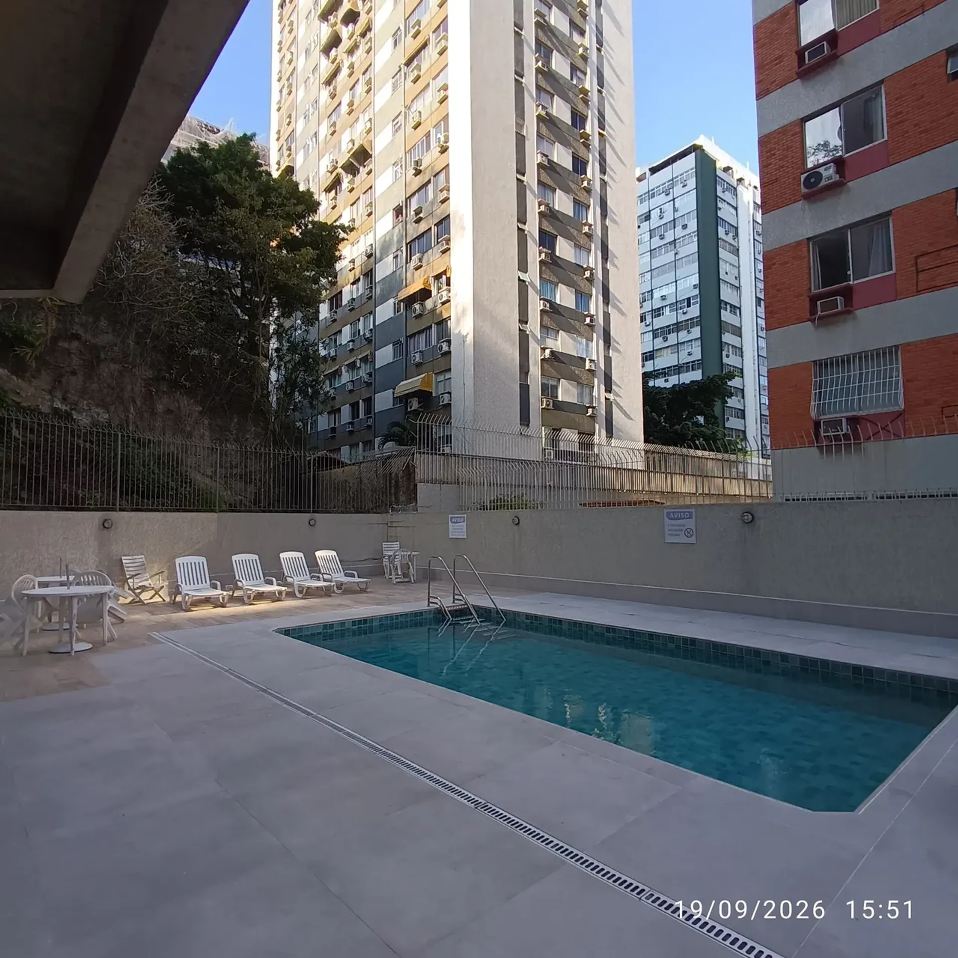 2-bedroom apartment in a building with a pool — photo 11