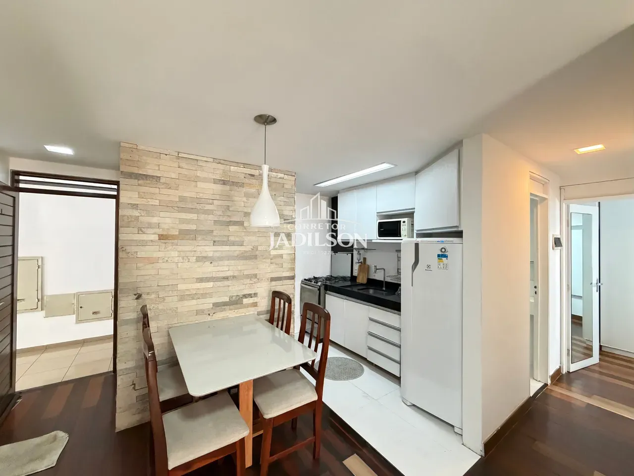 2-bedroom apartment in a building with a pool — photo 9