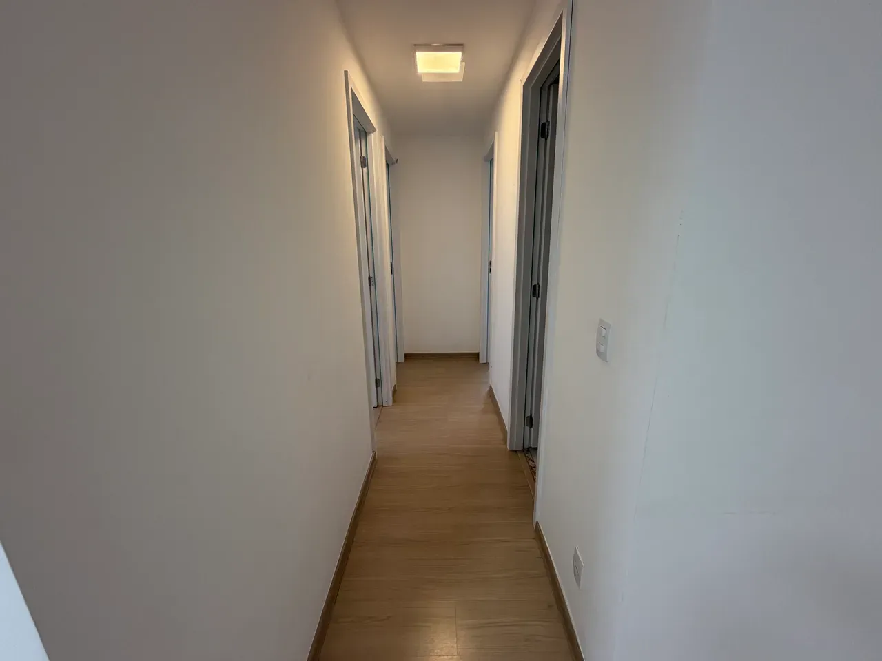 Wood or laminate floors in a 3-bedroom apartment, 69 m² — photo 15