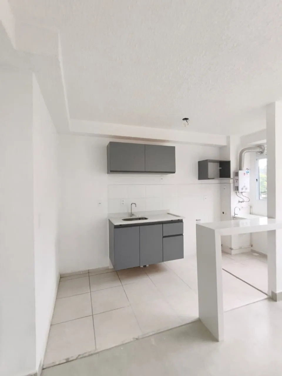 2-bedroom apartment in a building with a pool — photo 4