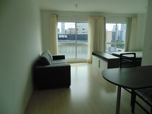 Furnished 43 m² studio with an open kitchen layout — photo 4