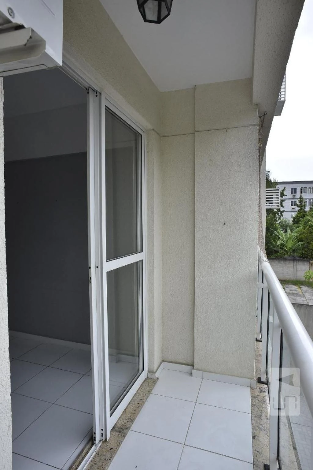2-bedroom apartment in a building with a pool — photo 18