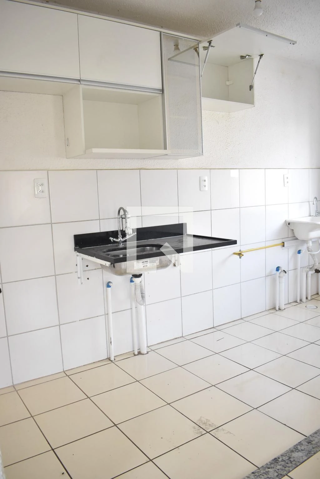 2-bedroom apartment in a building with a pool — photo 2