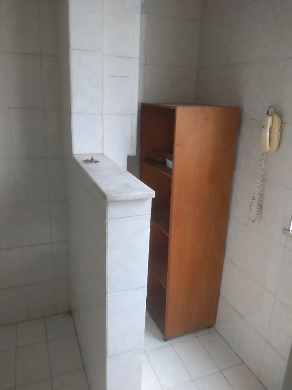 1-bedroom 1-bath apartment with a laundry area — photo 4