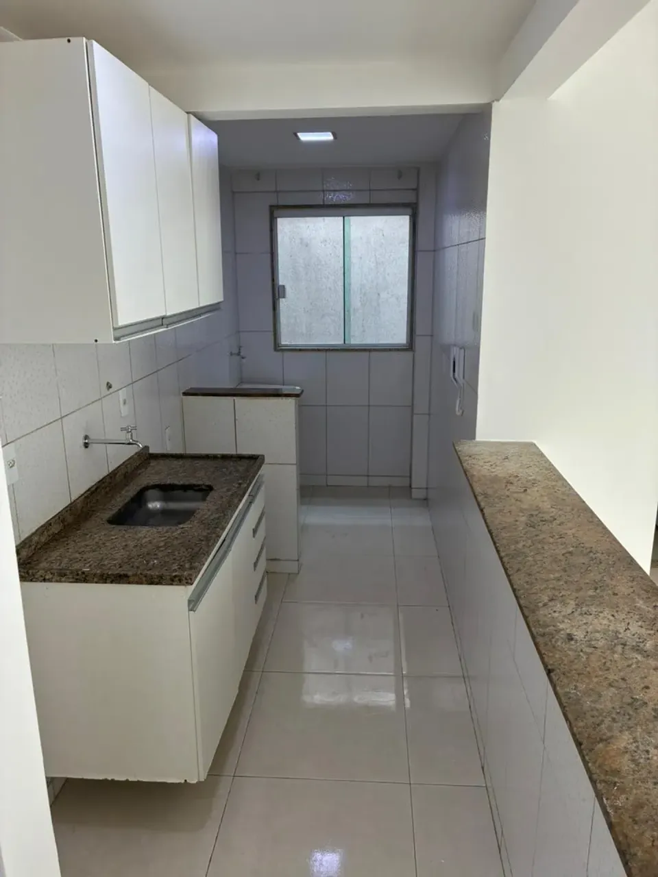 1-bedroom apartment with open-plan kitchen and balcony — photo 2