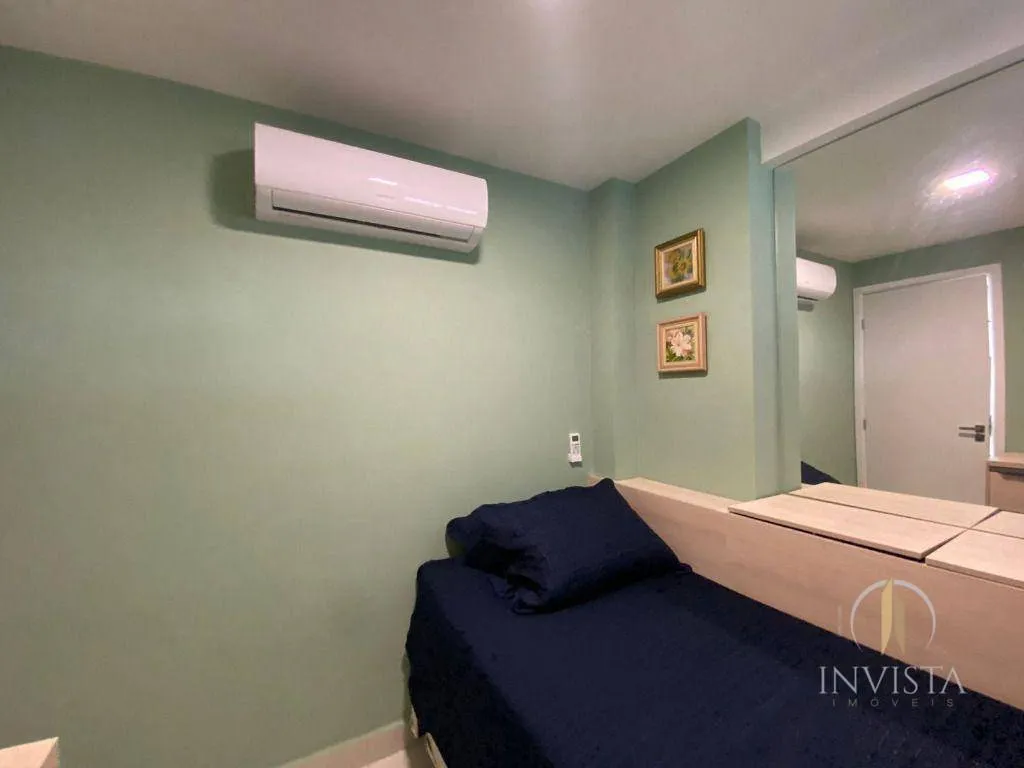 2-bedroom apartment in a building with a pool — photo 12