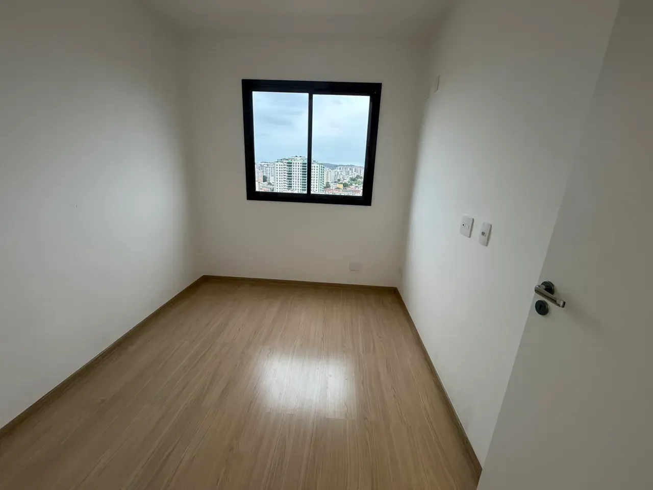 Wood or laminate floors in a 3-bedroom apartment, 69 m² — photo 19