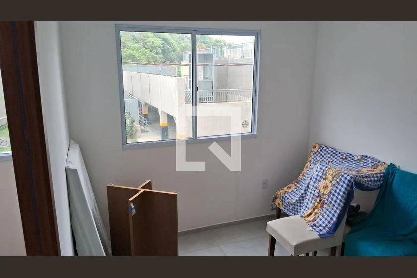 2-bedroom apartment in a building with a pool — photo 2