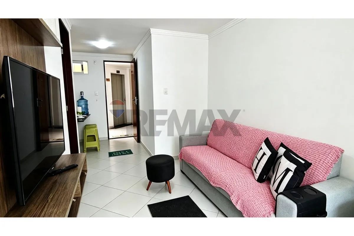 One-bedroom apartment in a building with a pool — photo 12