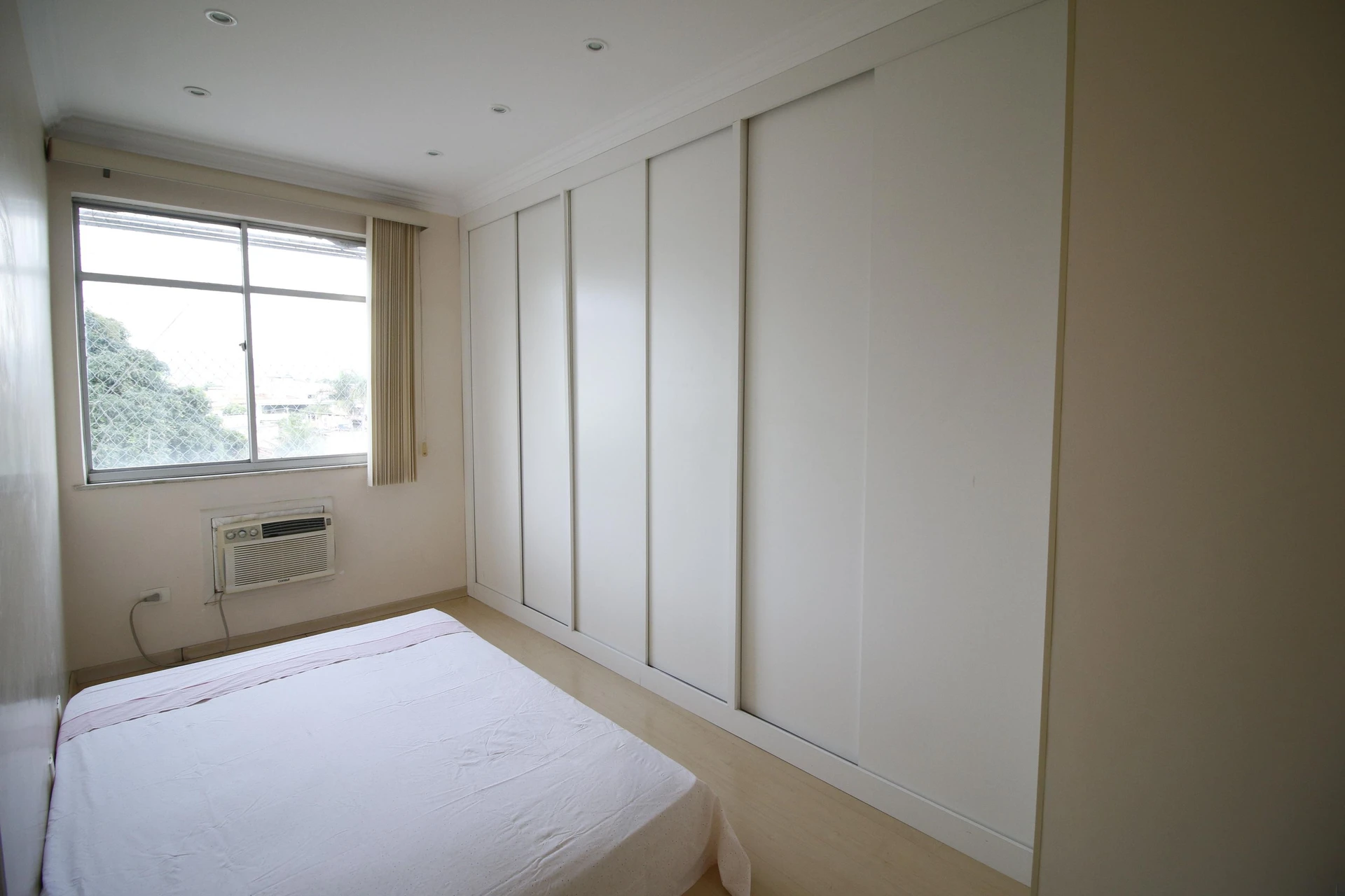 2-bedroom apartment in a building with a pool — photo 10