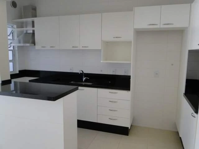 2-bedroom apartment in a building with a pool — photo 4