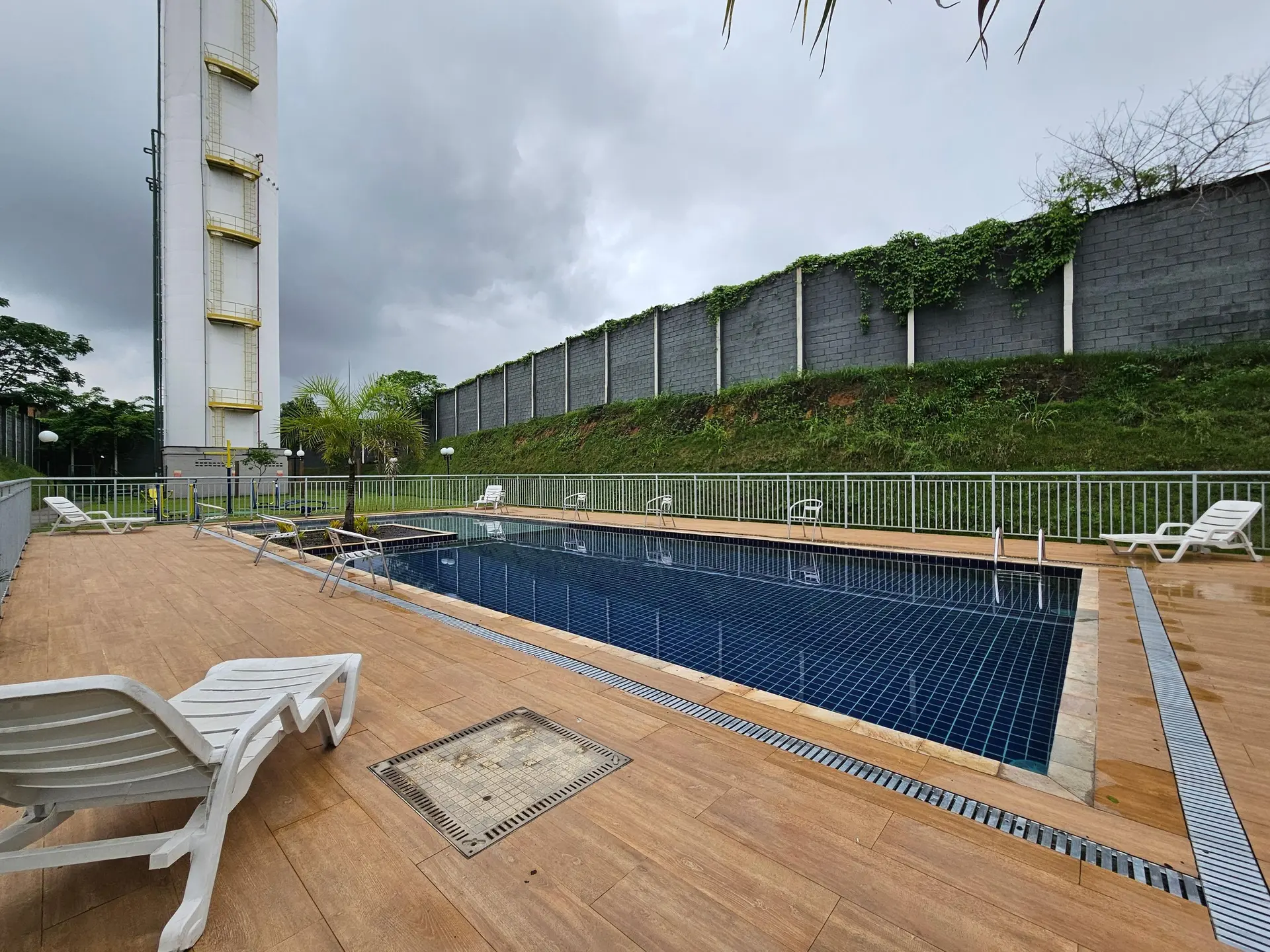 2-bedroom apartment in a building with a pool — photo 23