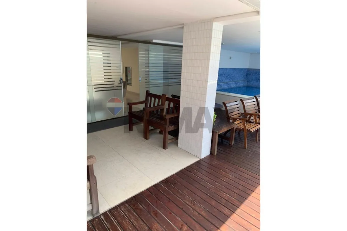 2-bedroom apartment in a building with a pool — photo 15