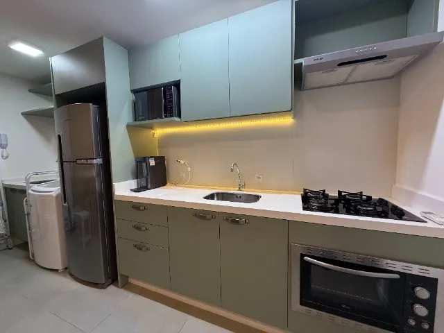 One-bedroom apartment with a washing machine — photo 2