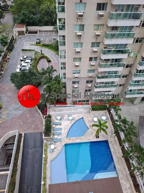2-bedroom apartment in a building with a pool — photo 10
