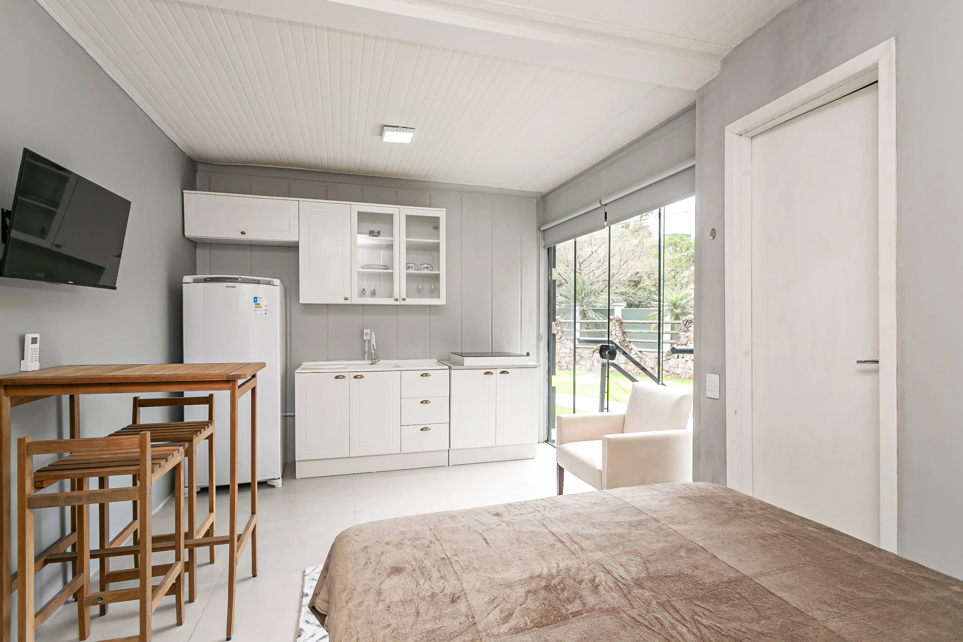 Studio mobiliado de 20 m² com 1 quarto e cozinha compacta — photo 3