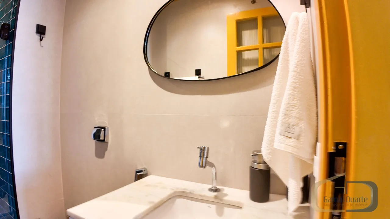 Furnished apartment with open-plan kitchen and glass shower — photo 13
