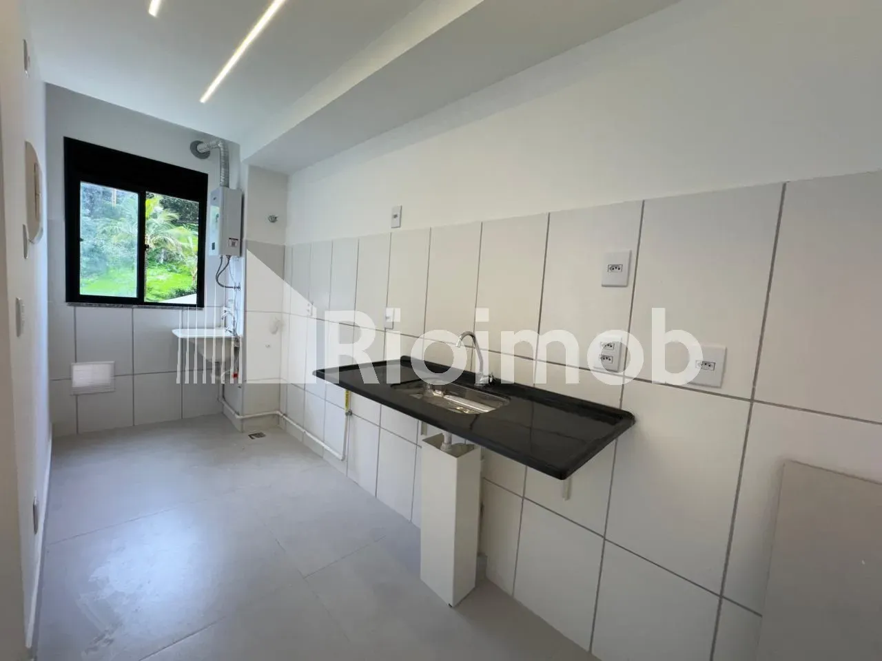 2-bedroom apartment with an open-plan kitchen — photo 4