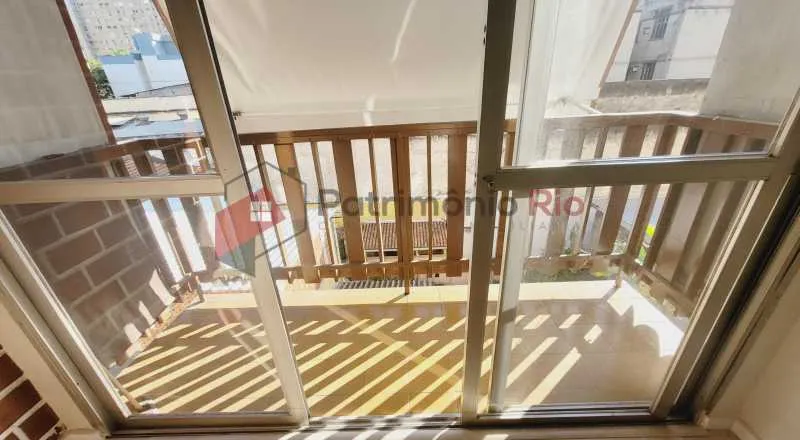 2-bedroom apartment in a building with a pool — photo 9