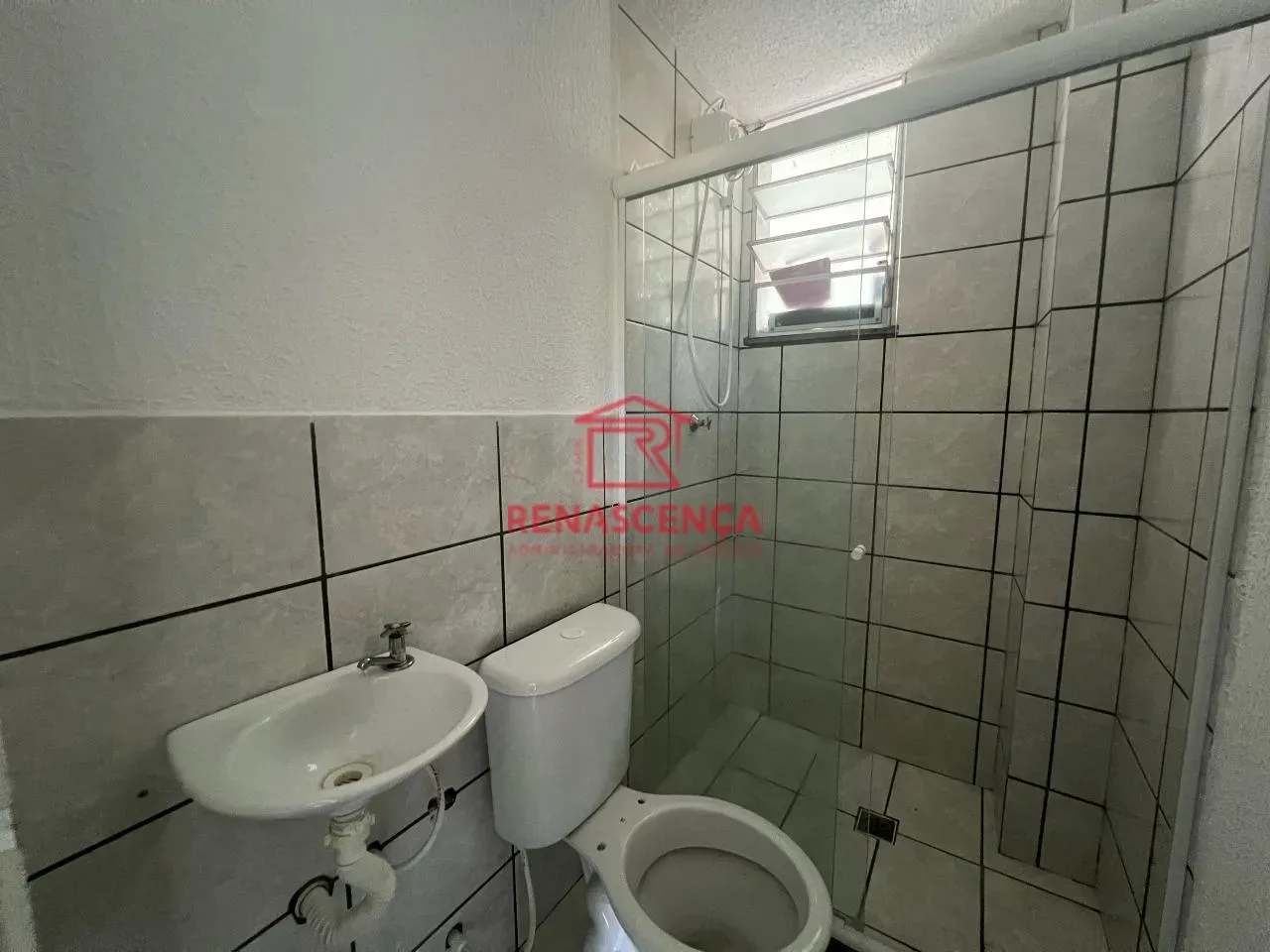 2-bedroom apartment in a building with a pool