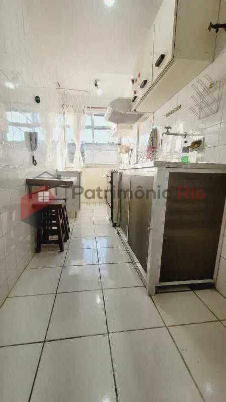 2-bedroom apartment in a building with a pool — photo 12