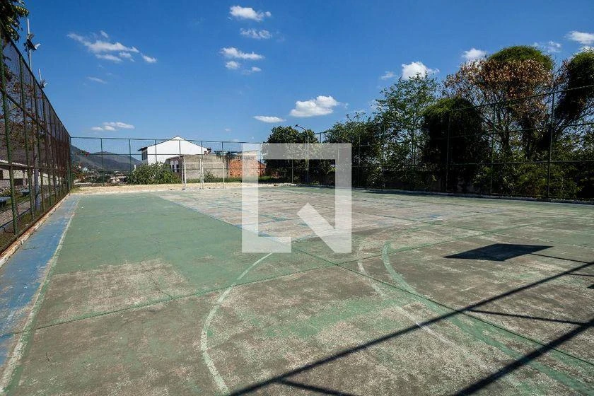 2-bedroom apartment in a building with a pool — photo 25