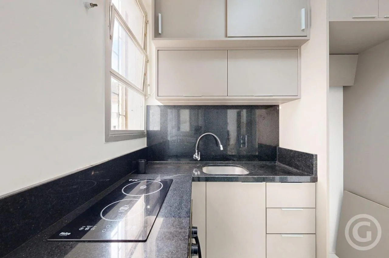 Apartamento de 54 m² com 2 dormitórios e fogão elétrico — photo 4