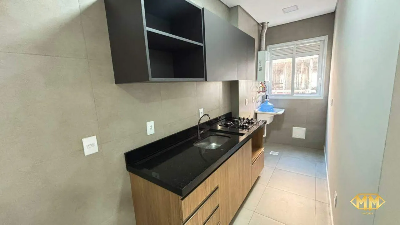 Apartamento de 2 dormitórios no 2º andar com cozinha aberta a gás — photo 8