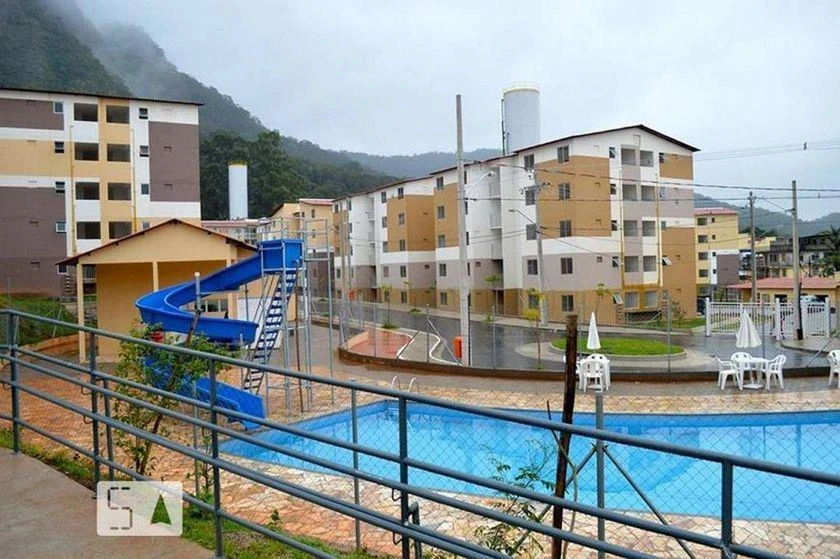 2-bedroom apartment in a building with a pool — photo 9