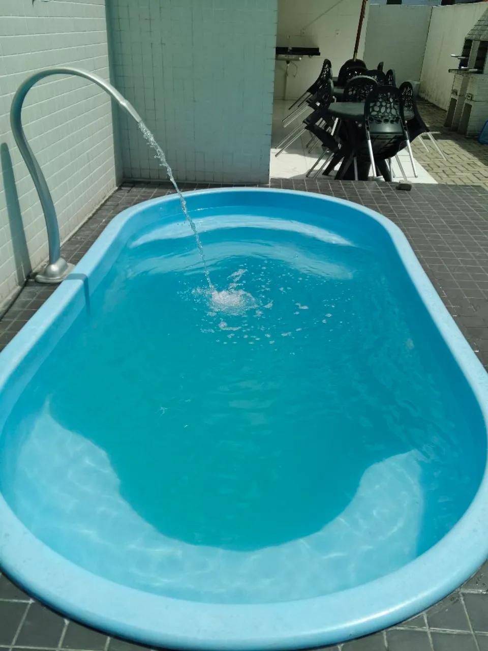 2-bedroom apartment in a building with a pool — photo 6