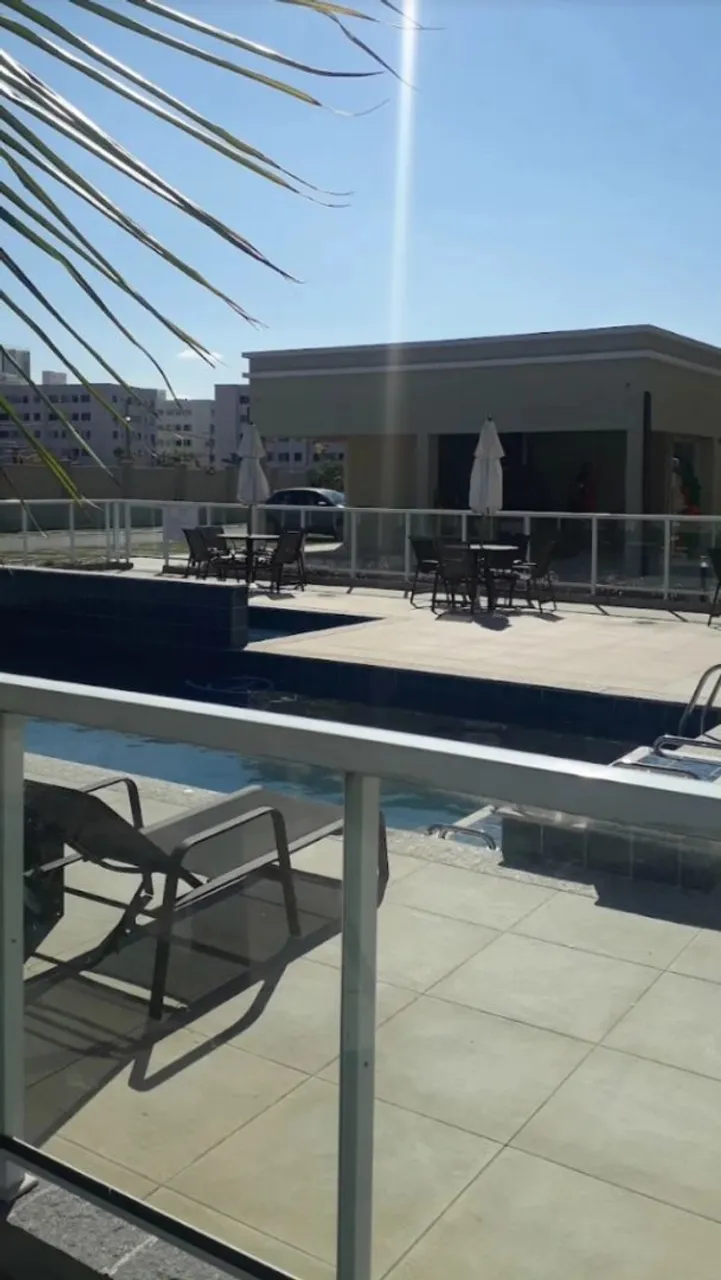 2-bedroom apartment in a building with a pool — photo 6