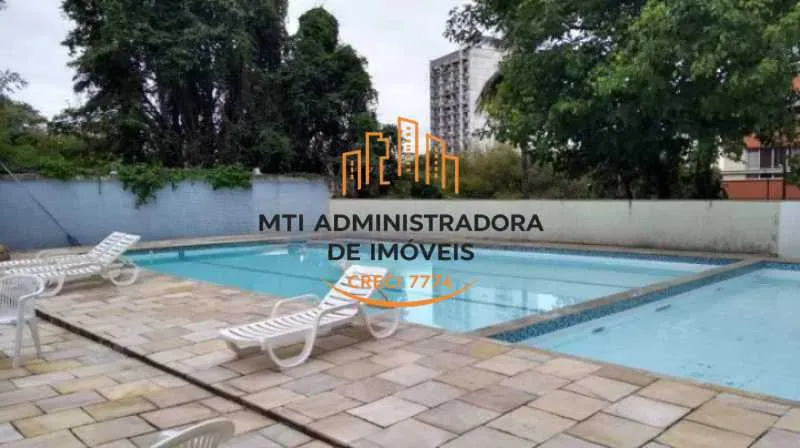 2-bedroom apartment in a building with a pool — photo 26