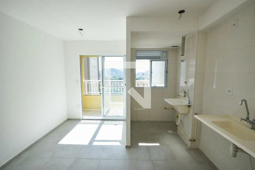 2-bedroom apartment in a building with a pool — photo 2