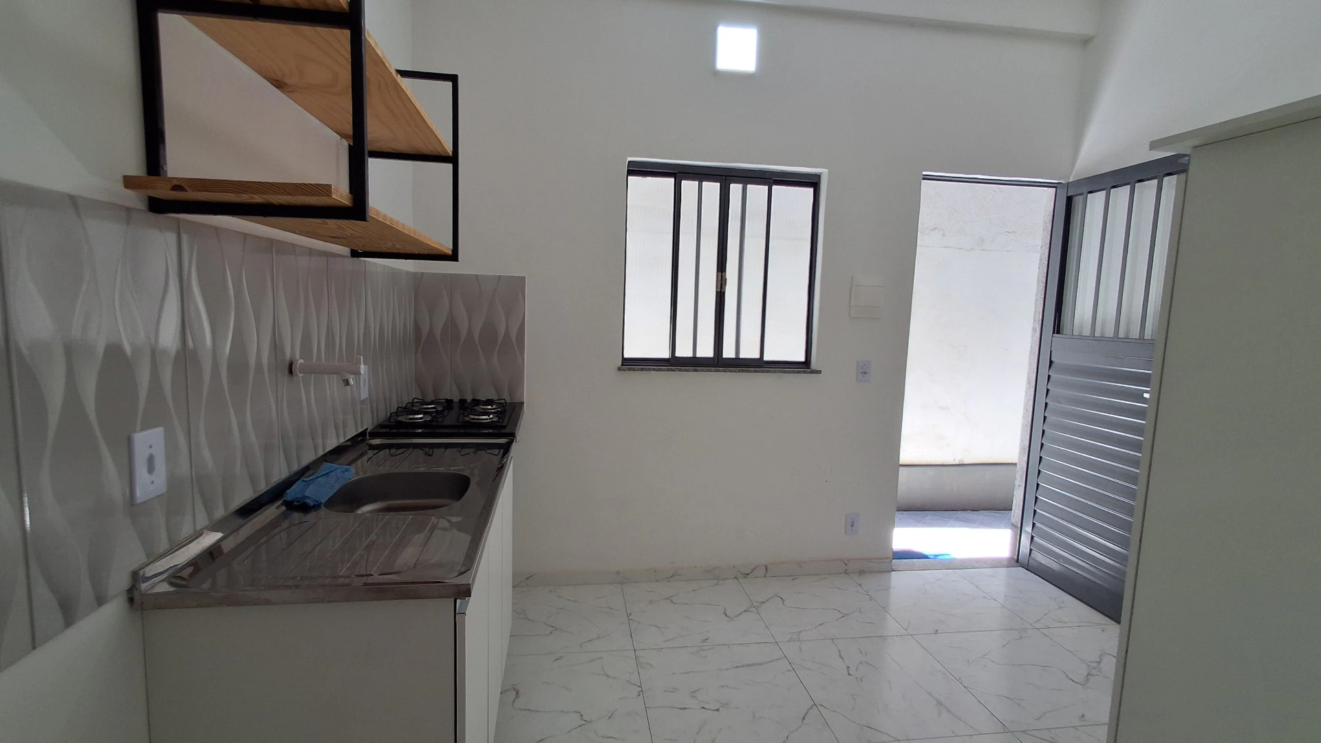 Studio-style kitnet with 1 bedroom and 1 bath — photo 11