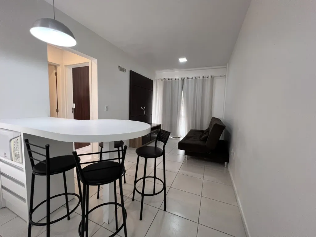One-bedroom apartment in a building with a pool — photo 7