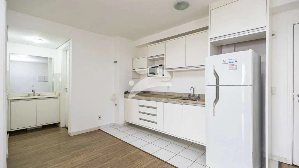 1-bedroom apartment with open-plan kitchen and balcony — photo 2