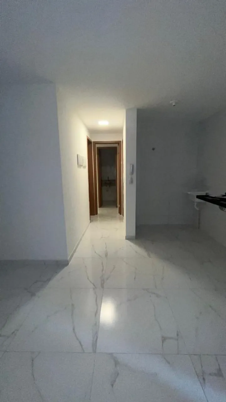 2-bedroom apartment in a building with a pool — photo 7