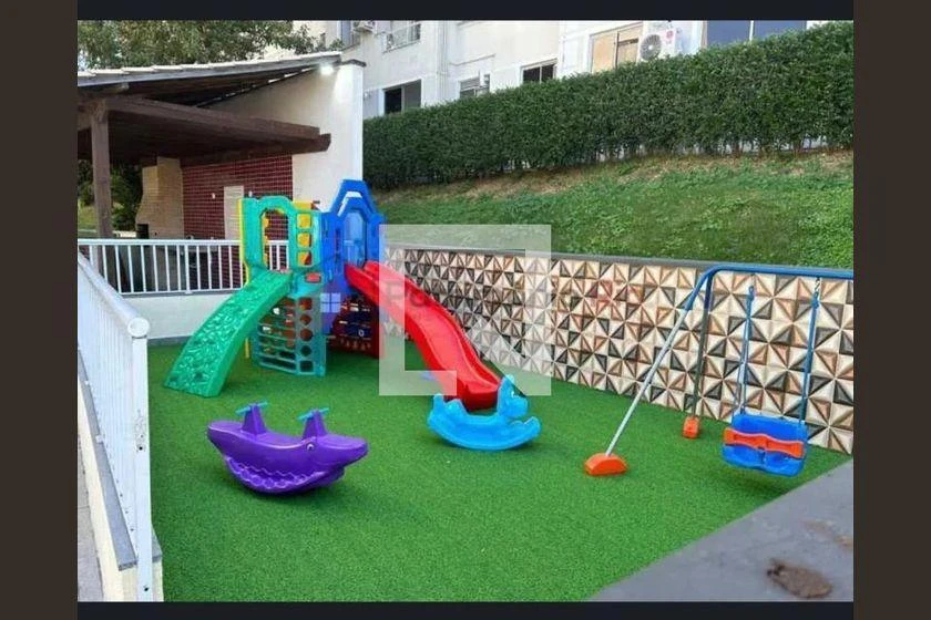 2-bedroom apartment in a building with a pool — photo 13