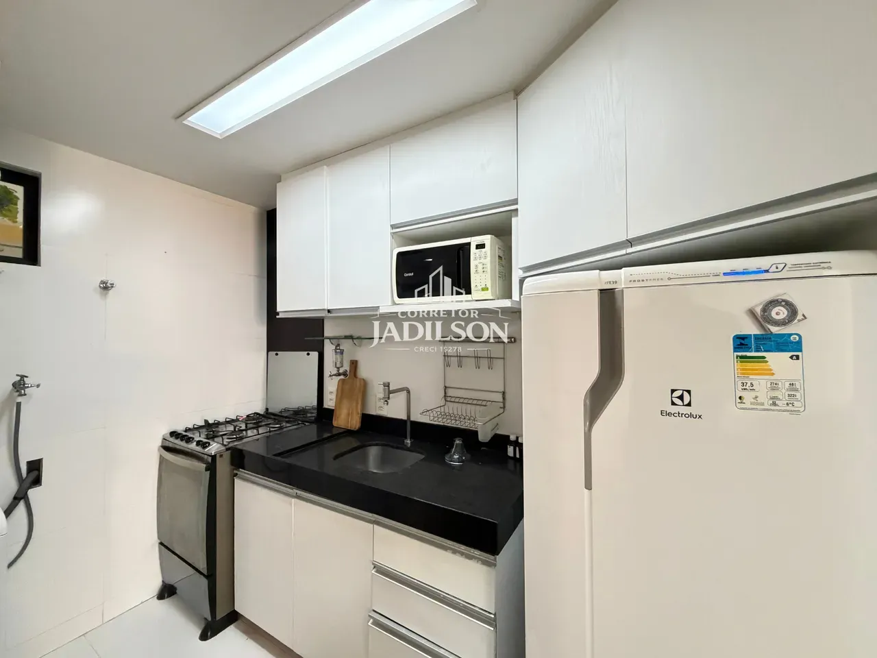 2-bedroom apartment in a building with a pool — photo 2