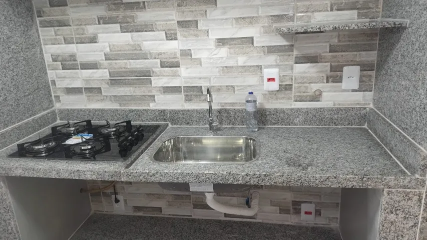 2-bedroom apartment in a building with a pool — photo 2