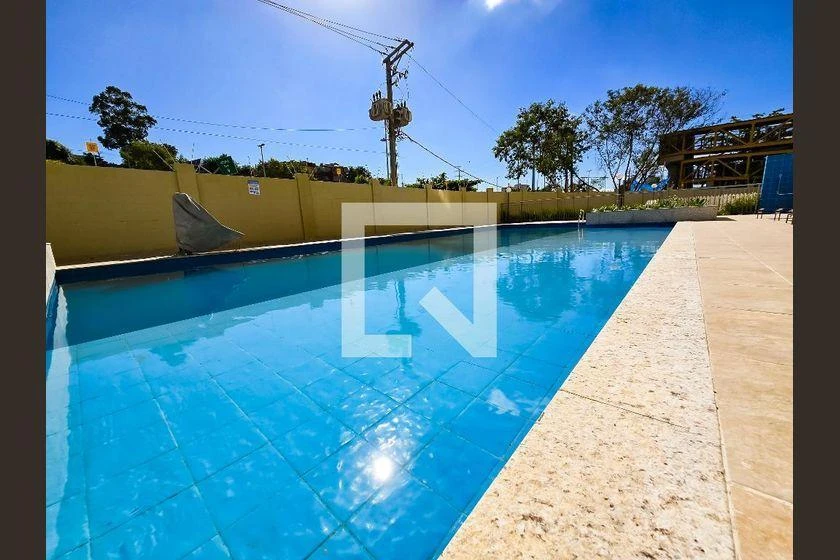 2-bedroom apartment in a building with a pool — photo 17