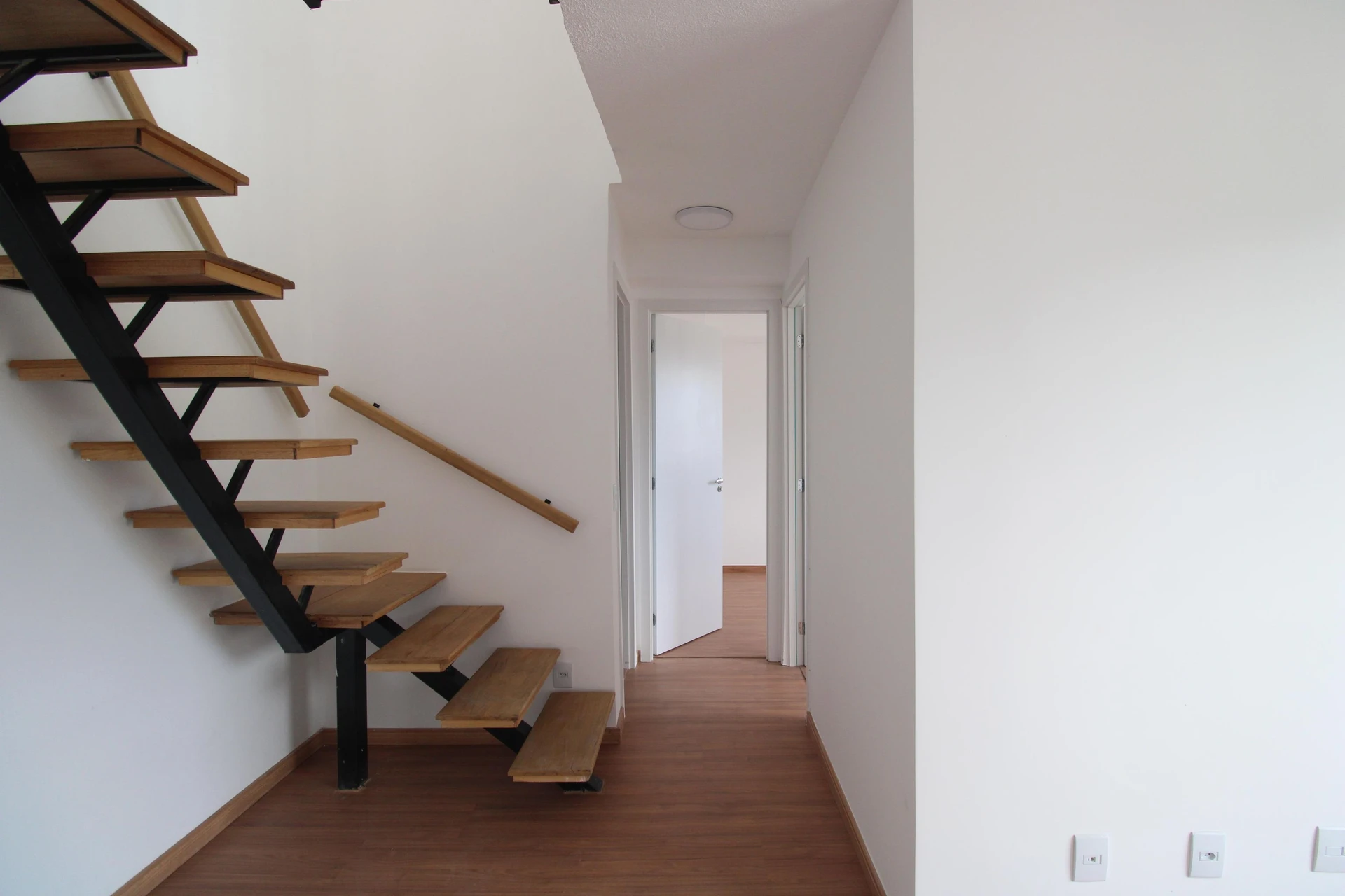 Unfurnished 2-bedroom apartment with balcony and private garden — photo 26