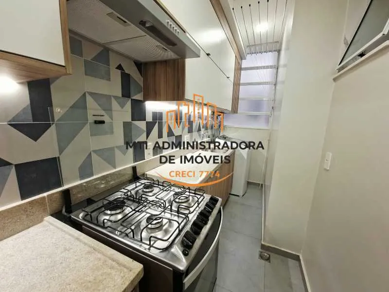 2-bedroom apartment in a building with a pool — photo 4
